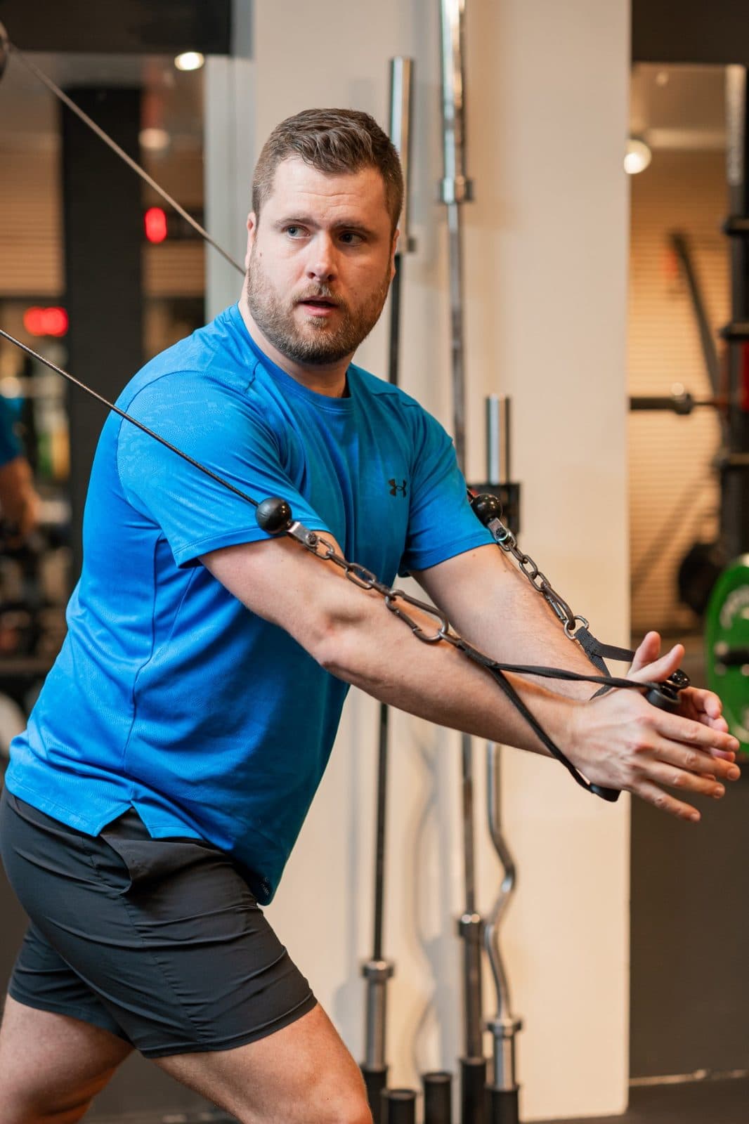 Client performing a strength training exercise during personal training near Clapham Junction